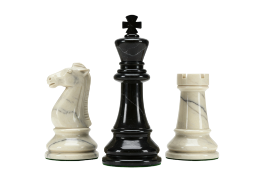 Isolated chess pieces King, Knight and Rook, a marble chess set displayed with a tall King
