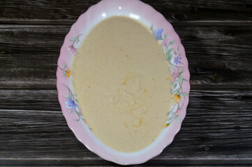 Tahini Tahina which is a Middle Eastern condiment made from toasted ground hulled sesame, served by itself (as a dip), with spices and herbs, Seafood Tahini used as a dip and an appetizer side plate