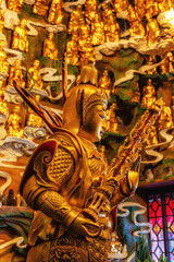 Fototapeta premium Close-up of golden statues, Longhua Temple, Shanghai, China