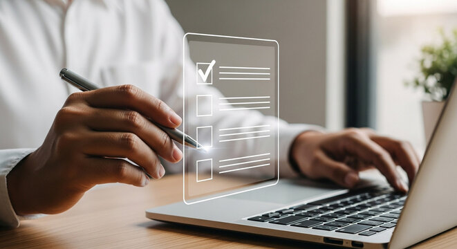 Person completes a checklist on a digital screen using a pen and laptop task completion