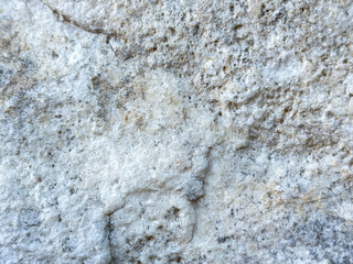 Close-up of natural stone texture with weathered surface patterns