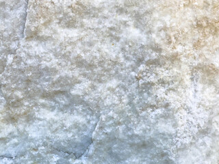 Close-up textured surface of natural white marble stone
