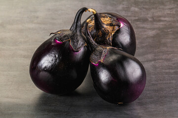 Raw violet and black eggplant