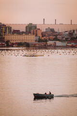 Taranto seafront with boats at dusk