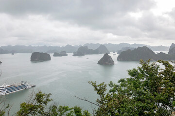 Happy european family, visiting Ha Long bay on a cruise with pool, visiting caves and landview...