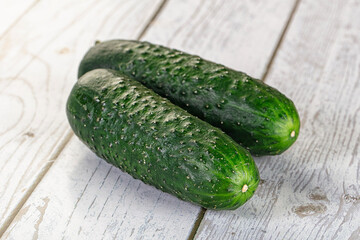 Ripe green raw two cucumbers