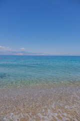 Obraz premium Blue, calm mediterranean sea at gulf of Corinth, Peloponnes, Greece
