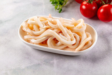 Canned marinated squid rings heap