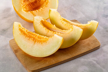 Ripe sweet juicy melon with slices