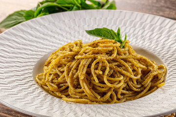 Italian green pasta with pesto sauce