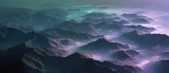 An ethereal panorama of rolling, fog-shrouded mountains at dawn or dusk, exhibiting a cool, purplish-teal color palette