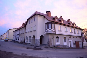 An old building at sunset in the village of Zheleznodorozhny, Kaliningrad region