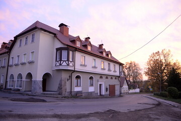 An old building at sunset in the village of Zheleznodorozhny, Kaliningrad region