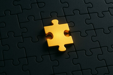 Fototapeta premium The Golden Piece: A Shining Puzzle Piece on a Dark Background