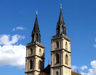 Fototapeta premium Two church towers against a clear sky