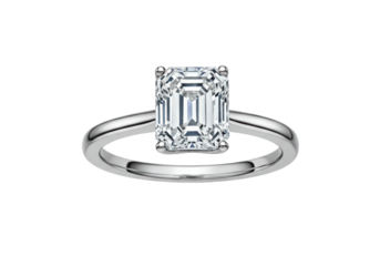 Isolated Emerald cut diamond engagement ring in silver setting on seamless backdrop
