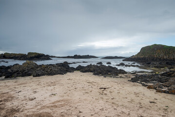Views of a rocky coast from Ballintoy Harbour, in the Antrim Coast and Glens, Northern Ireland