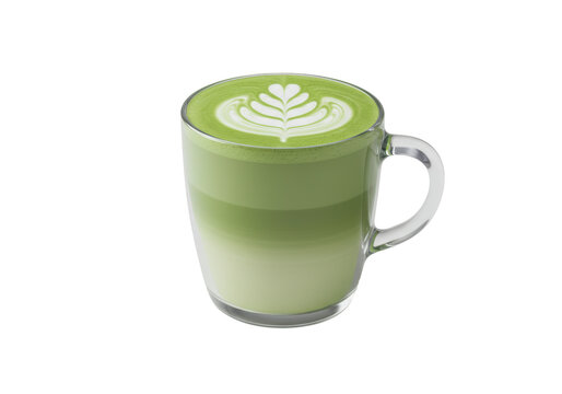 Isolated glass mug filled with fresh matcha tea latte and artful latte design on top