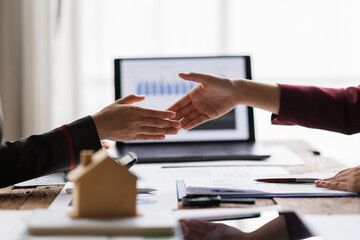 Real estate, success deal handshake or shaking hand with landlord realtor, client male after buyer man signed rental, lease contract. Banker agreement mortgage loan, property lease.

