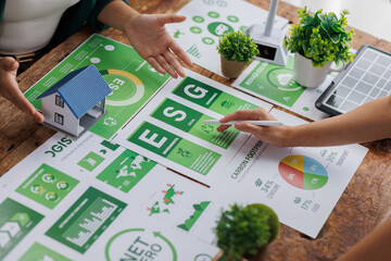 Close up of Group of businesspeople in team brainstorm meeting discussion on ESG (Environmental, social, corporate governance) organization planning. Sustainable business, coworker people teamwork. 
