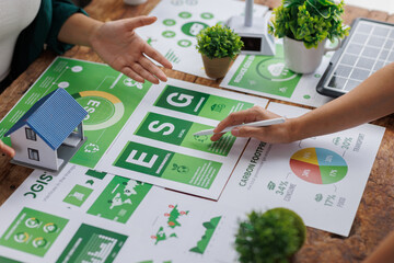 Close up of Group of businesspeople in team brainstorm meeting discussion on ESG (Environmental,...