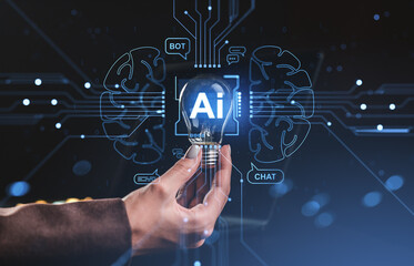 Human hand holding lightbulb with AI text and digital brain circuits concept.