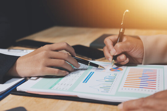 Accounting company provide finance and taxation planning for profitable cash flow, Auditor and accountant team working in office, analyze financial data and accounting record with calculator.Insight