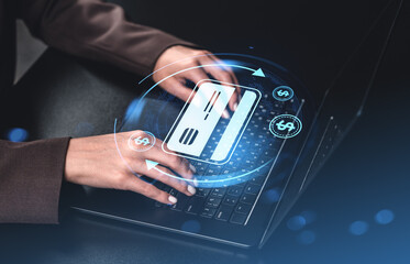 Woman using laptop for online credit card payment with digital hologram effect.