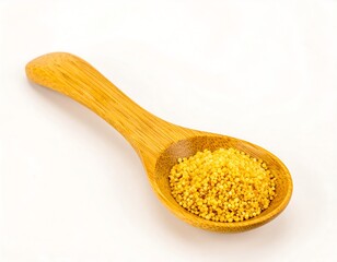Small, golden grains in a wooden spoon
