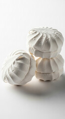 Sweet, fluffy white marshmallows piled high, perfect for baking, snacks, or delightful treats.