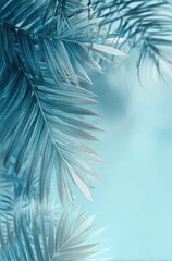 Teal palm fronds arching against a soft, light blue backdrop, creating a serene, tropical aesthetic