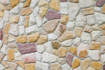 The walls of the house are decorated with large marble slabs.