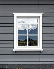 Obraz premium A window reflecting mountains