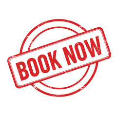 A red stamp with the words book now inside a circular frame