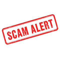 A red rubber stamp displaying the words scam alert clearly visible