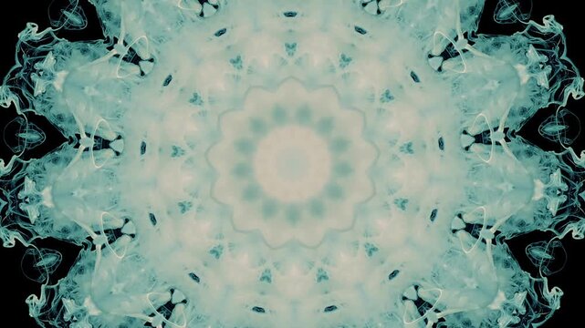 Magical blue and white lace on a black background.  Hypnotic abstract background. The concept of creating a star. Sacred mystical background. Moonlight charm.