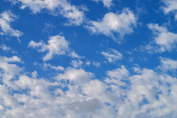 Blue sky with clouds. Bright blue sky with scattered white clouds.