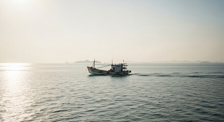 Fototapeta premium Tranquil Seascape with Fishing Boat at Dawn.
