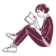 Young woman sitting cross legged on the floor engrossed in reading a book with a smile