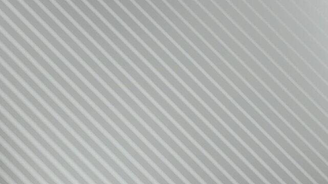 Light gray surface with repeating diagonal stripes. Suitable for modern backgrounds, web design, architectural projects, and minimalistic themed concepts.