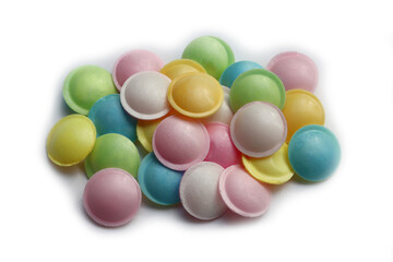 Flying saucer UFO shape sweet colorful candies on white background