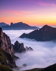 Majestic mountain sunrise through clouds