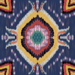 Seamless geometric pattern with vibrant color and ethnic style creates dynamic textile design for fabric or wallpaper with bold visual impact