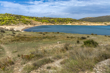 Wild sandy beach Podsilo on the island of Rab, empty beach without people, Rab, Croatia