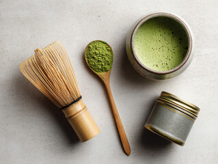Essential matcha tea tools including whisk, spoon, and powder.