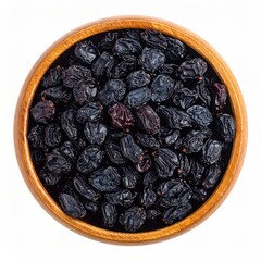 A wooden bowl brimming with dark, plump, dried black currants, viewed from directly overhead against a stark white backdrop