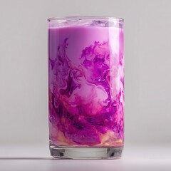 Artistic glass filled with a vibrant purple milk drink, isolated on a neutral background. Ideal for beverage, art, or lifestyle promotions with a creative twist.