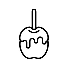 Candy apple with caramel dripping on a stick for Halloween  