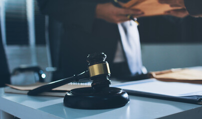 Lawyer explained to the client about the law that must be brought against the court case.