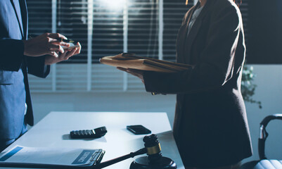 Lawyer explained to the client about the law that must be brought against the court case.